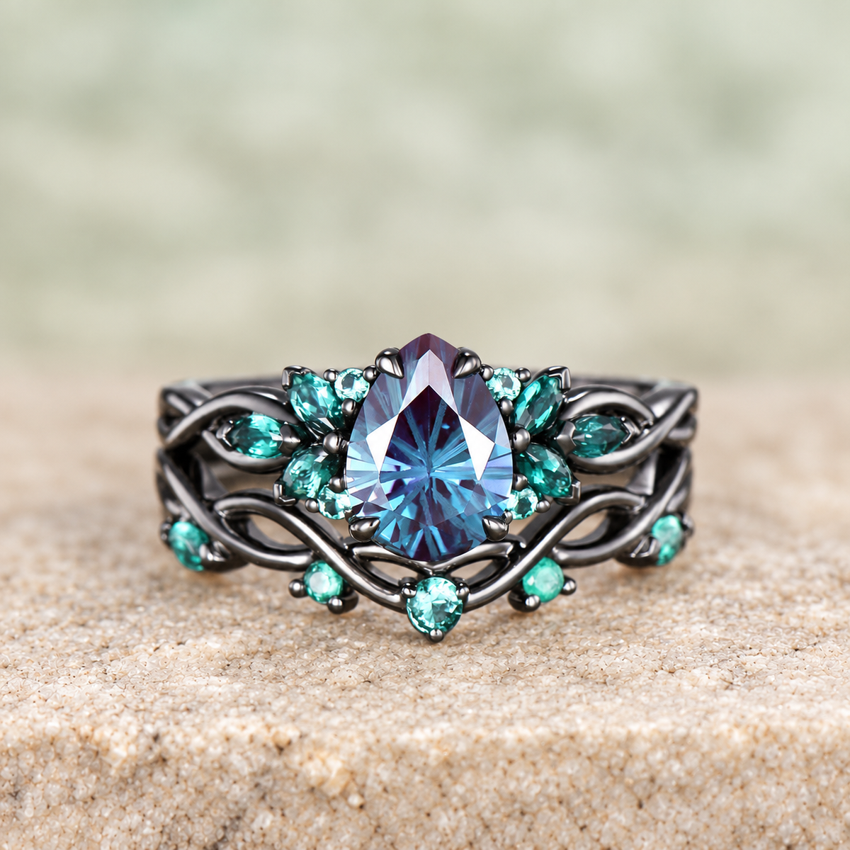 Pear Fireworks Alexandrite Infinity Bridal Ring Set — front view
